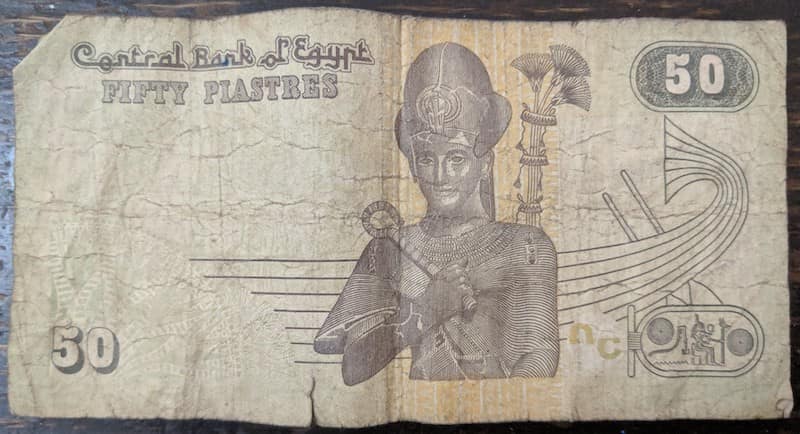 A 50 piaster note is equivalent to about 2-3 USD cents. It is the amount of money most people lose around the house, but it buys bread.