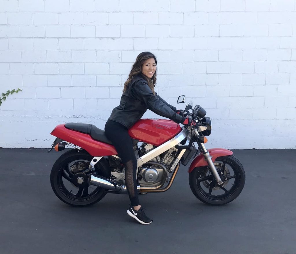 Jo learning to ride a motorcycleon a Honda Hawk NT650