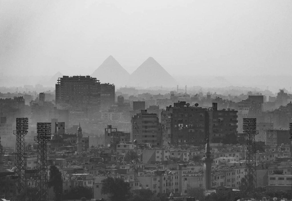 About Discover Discomfort _ Pyramids behind Cairo in Egypt