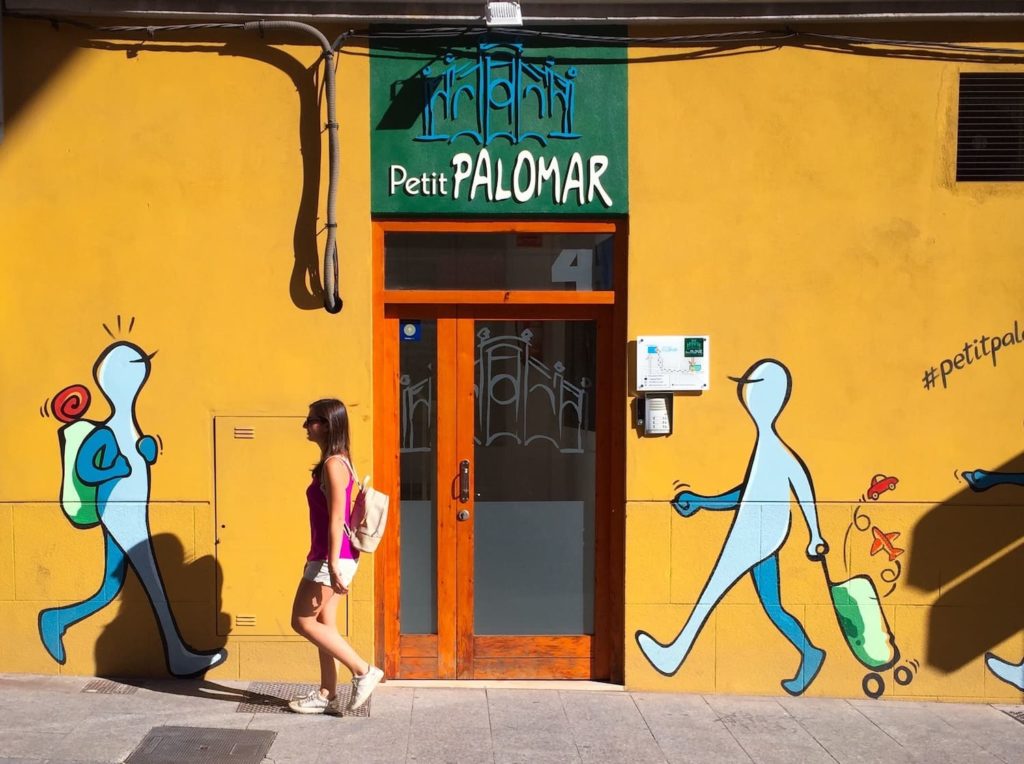 Person walking in Valencia, where Catalan is spoken