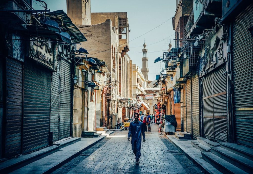 A man walking in Cairo, Egypt, in the Islamic quarter