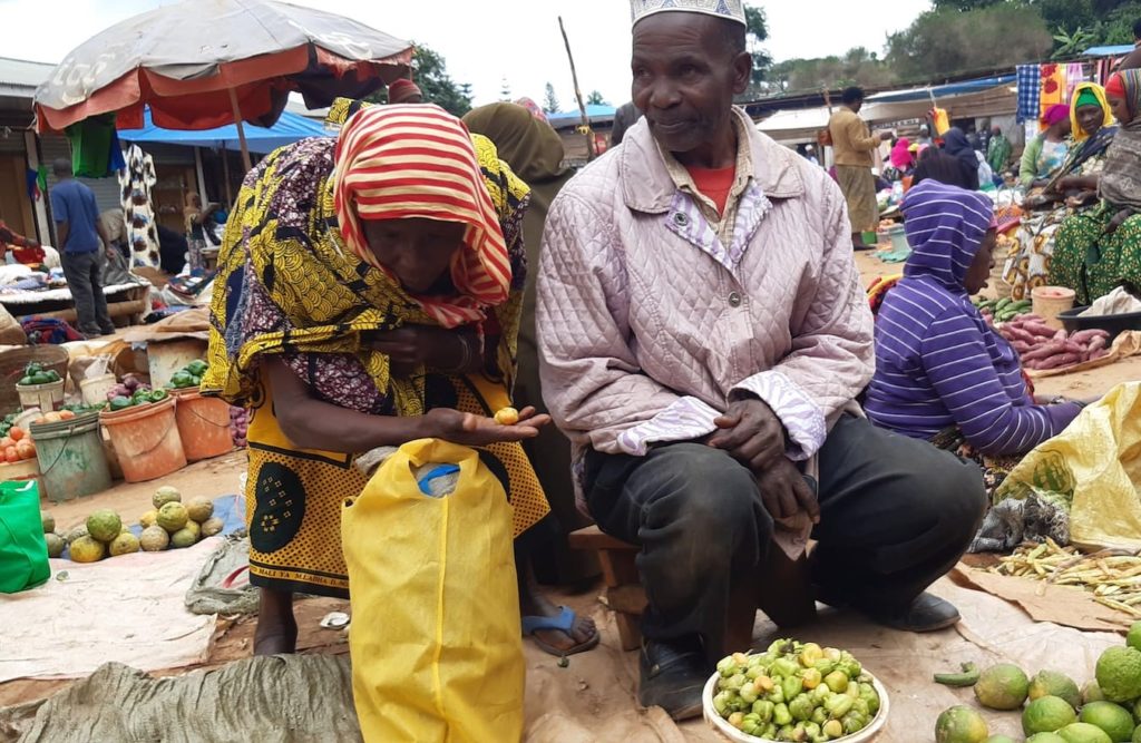 Elderly swahili-speaking people in a market in Tanzania