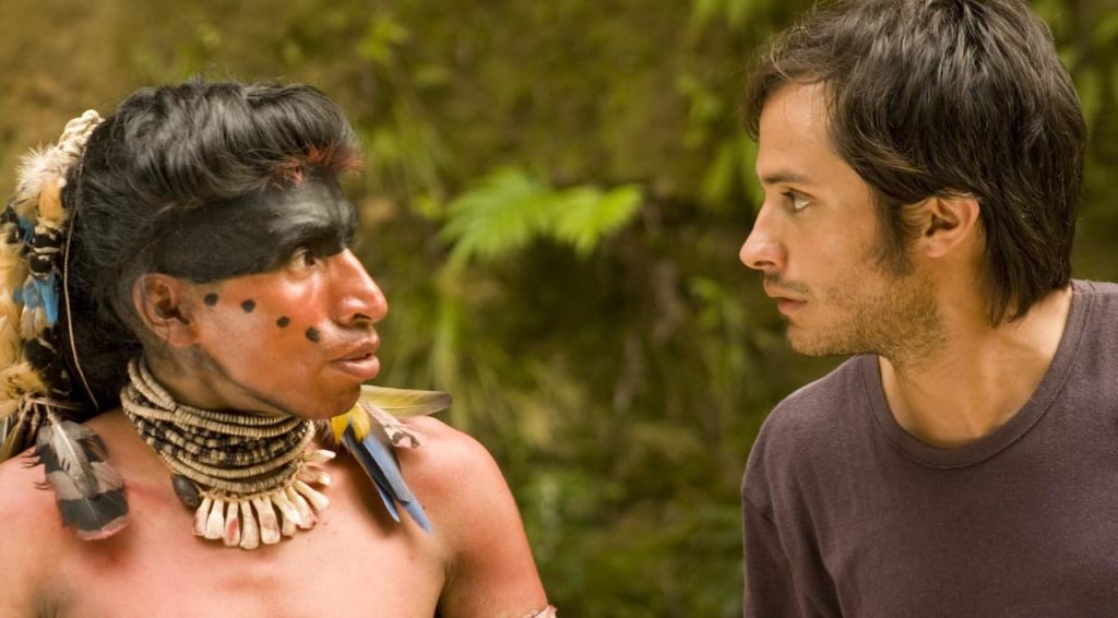 Screen grab of native american Quechua man talking to producer of film in Tambien la Lluvia, a spanish language movie from argentina