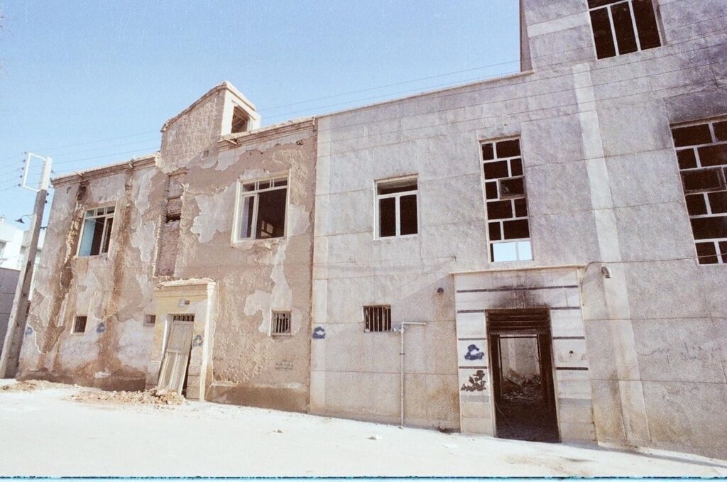 A torched entry door to a Baha'i-owned home during the time of the Islamic revolution