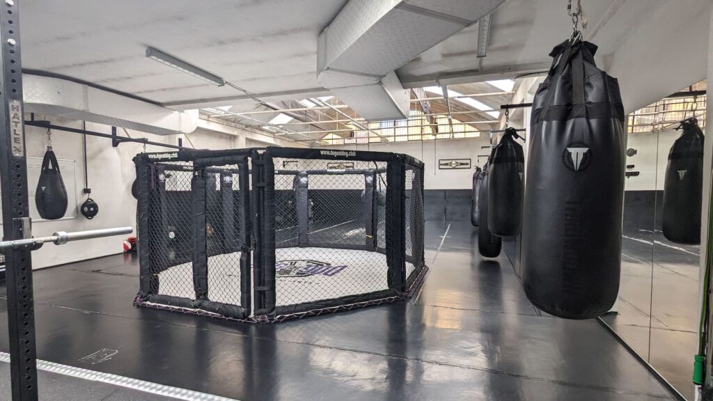 Dog Eat Dog MMA cage and boxing bags plus rolling space
